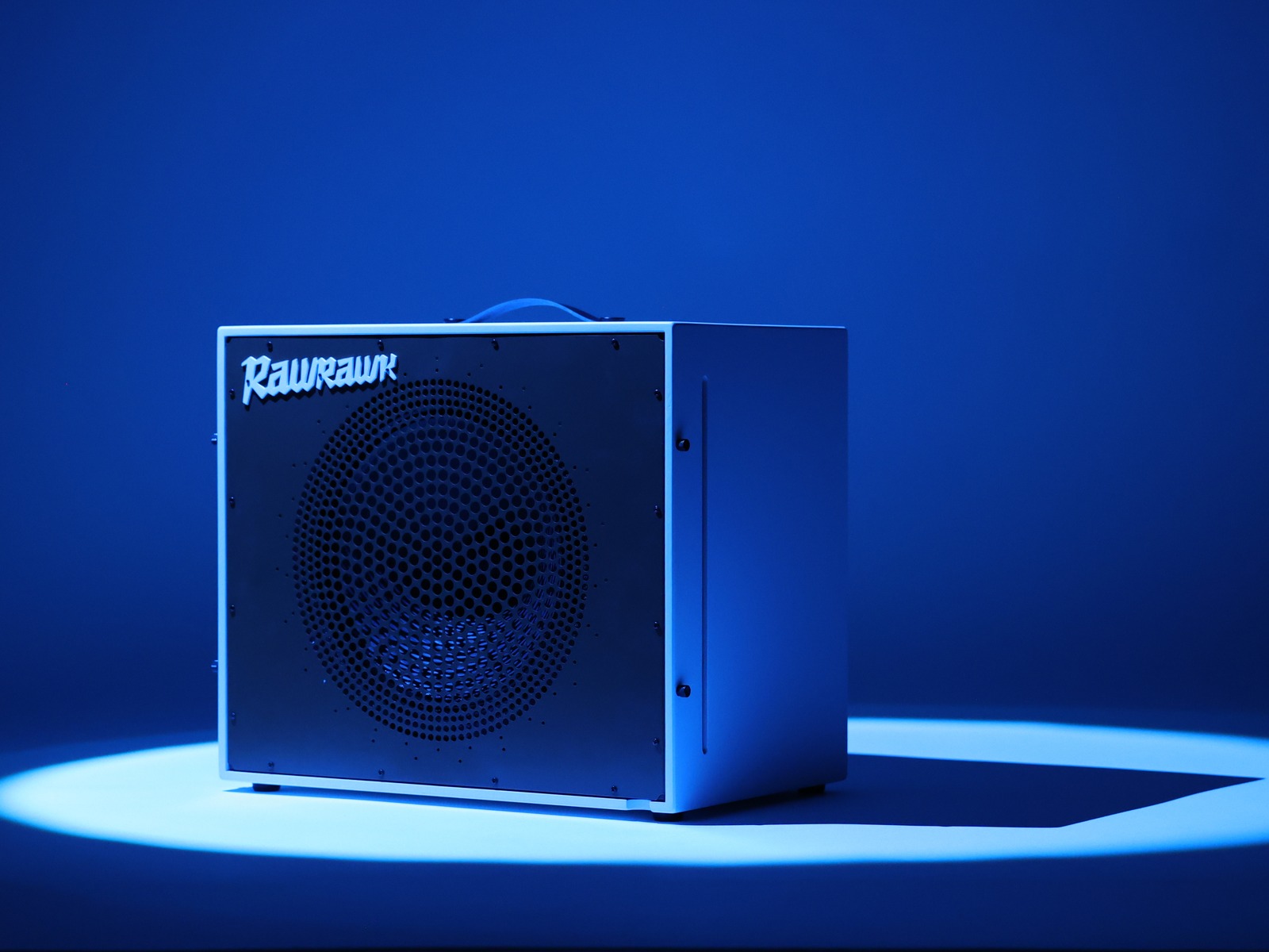Rawrawk Quasar 1×12 under blue studio spotlight — product hero photograph